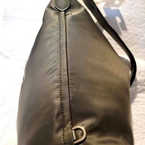 New Dark green purse or sling back